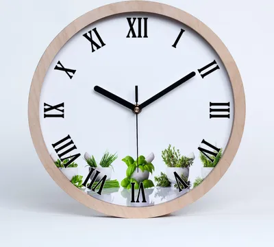 Produktbild von Holzuhr 25fi cm wanduhr - schwarze Spitzen - Kräuter