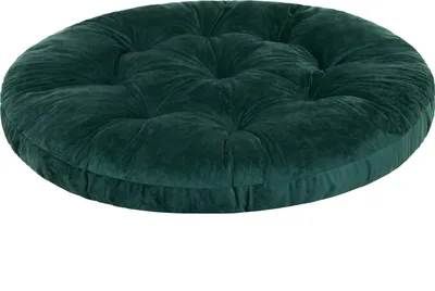 A round, tufted cushion in a dark green velvet material, presented on a white background.