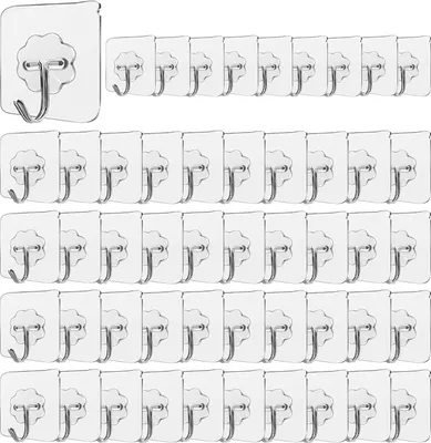 A collage of clear adhesive hooks arranged in multiple rows.