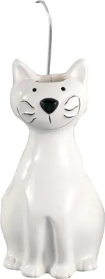 A white ceramic cat-shaped humidifier for a radiator.