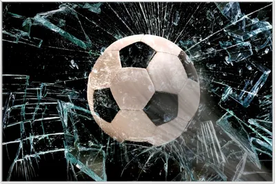 Produktbild von Wallario Wandbild Fußball - im Fenster, Splitter und Glas, Größe: 61 x 91,50 cm, Poster mit weißem Aluminiumrahmen