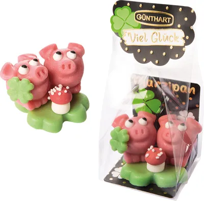 Produktbild von Günthart Marzipan Schweinchen auf Kleeblatt, im Cellophanbeutel