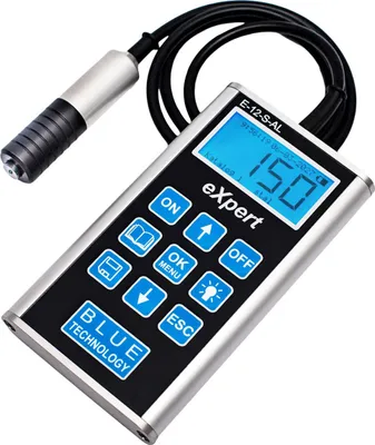 A digital thickness gauge with a probe and a display screen.