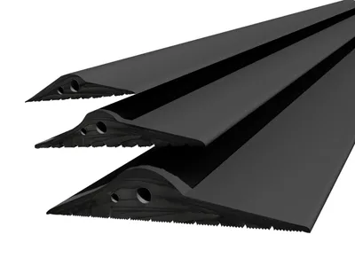 Three black rubber seals are stacked on top of each other against a white background.