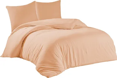 A peach-colored duvet cover and two pillowcases are neatly arranged on a bed, presented against a plain white background.