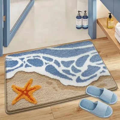 Productafbeelding van Pluizen badmat 51x79 cm – zacht, absorberend, antislip, met zeestermotief, machinewasbaar