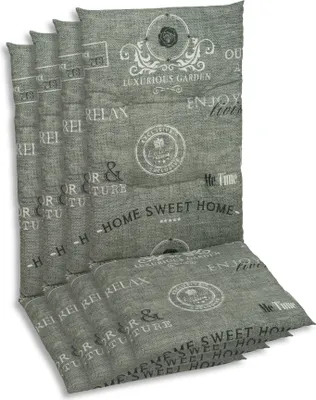 A stack of gray chair cushions with a printed pattern of text and decorative elements.