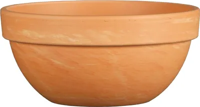 A close-up, front-facing studio shot of a terracotta planter bowl.