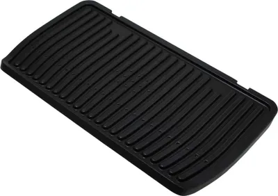 A black grill plate with raised ridges, presented on a white background.