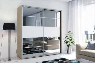 A modern bedroom or living room scene featuring a large mirrored wardrobe.