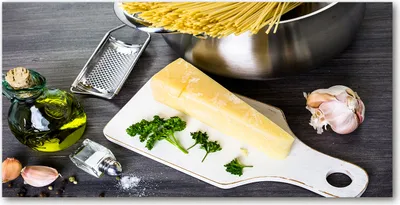 Produktbild von Tulup Glas-Bild -140x70- Wandkunst Dekorative Wand für Küche & Wohnzimmer - Essen & Getränke - Pasta Knoblauch - Mehrfarbig