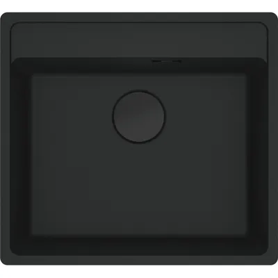 A top-down view of a black sink basin with a circular drain cover in the center.