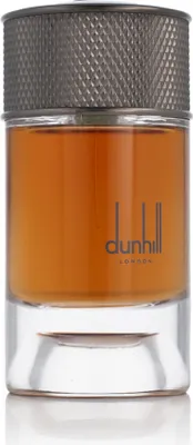 A close-up studio shot of a Dunhill perfume bottle.