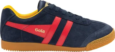 A side view of a blue Gola sneaker with red accents and a brown sole.