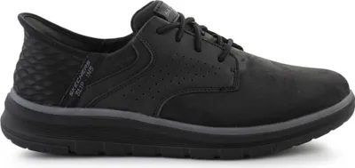 A studio shot of a single black Skechers shoe.