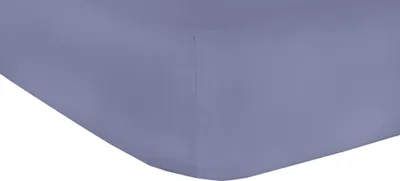 A close-up view of a fitted sheet, showing the corner and a seam.