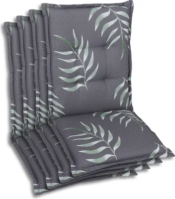 A stack of chair cushions with a leaf pattern.