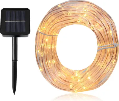 A solar panel and a coiled string of lights.