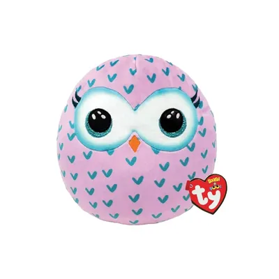A plush owl toy with a Ty tag.