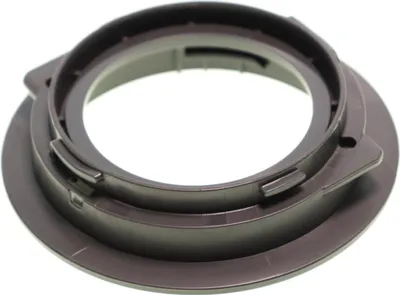 A close-up studio shot of a brown plastic part for a blender.
