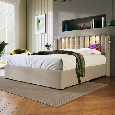 A bedroom scene with a bed, rug, and artwork.
