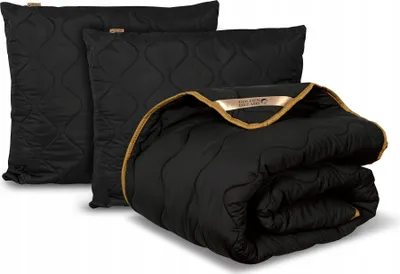 A black quilted blanket and two matching pillowcases are displayed on a white background.