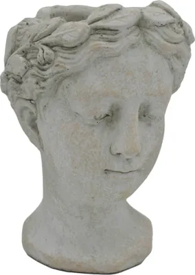 A close-up of a decorative bust planter.