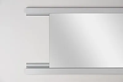 A close-up view of a silver mirror mounting profile system against a white background.
