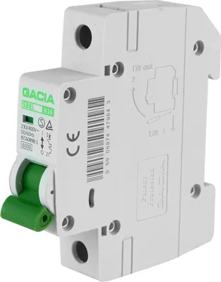 A white electrical circuit breaker with green toggle switch.
