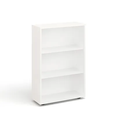 A white, three-shelf bookcase is shown against a white background.