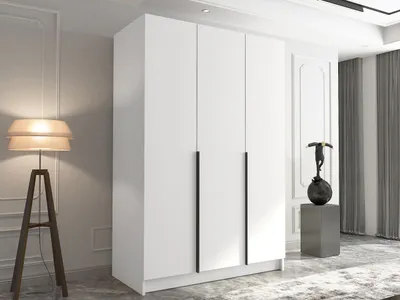 A modern bedroom interior with a white wardrobe and a floor lamp.