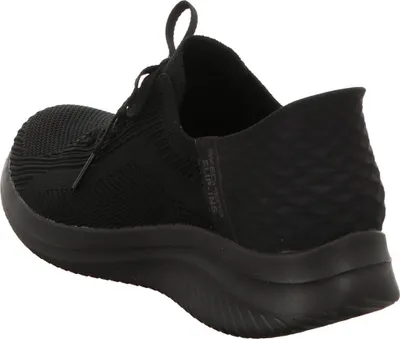 A black Skechers Slip-Ins shoe is shown from the side and back.