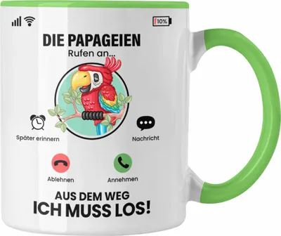 Produktbild von Trendation - Die Papageien Rufen An Tasse Geschenk für Papageien Züchter Besitzer Geschenkidee Lustig Spruch (Grün)