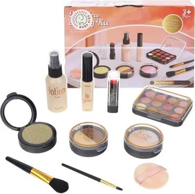 A collection of children's makeup toys, including lipstick, lotion, lip gloss, eyeshadow palettes, and brushes, arranged on a white background.