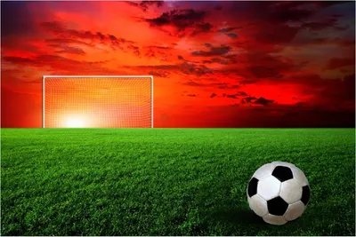 Produktbild von Wallario selbstklebendes Poster - Fußball - Fußballfeld bei Sonnenuntergang, Größe: 100 x 150 cm