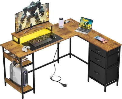 Immagine prodotto di Scrivania angolare a forma di L, dimensioni 142x118 cm, con cassetti, presa di corrente e porta USB, ampia scrivania per computer con spazio di archiviazione, ideale per l'ufficio domestico