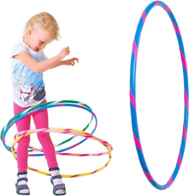 A young girl is playing with hula hoops, and a separate hula hoop is shown on the right side of the image.