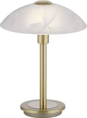 A table lamp with a white, swirled glass shade and a gold-colored stem and base.