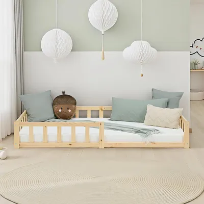 A child's bedroom with a wooden bed and decorative elements.