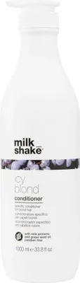 A white bottle of Milk_Shake Icy Blond Conditioner with a pump dispenser.