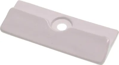 A white plastic latch for a refrigerator freezer drawer.