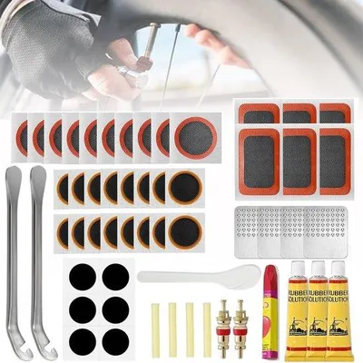 Produktbild von Unyqoos® 56‑teiliges Fahrrad-Reparaturset mit selbstklebenden und vulkanisierbaren Flicken, Reifenhebern – kompakt, 120 g, für Fahrrad, Motorrad und Luftmatratzen