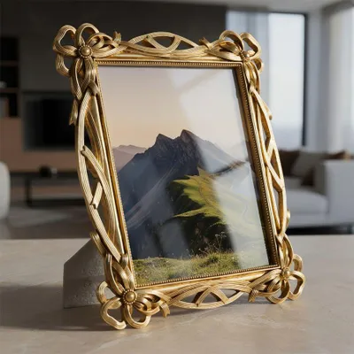 Immagine prodotto di Cornice fotografica "Knoten" in resina, 20x25 cm, color oro, marca Mauro Ferretti
