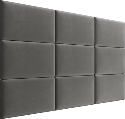 A wall of upholstered panels.