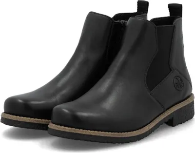 A pair of black leather Chelsea boots are shown against a white background.