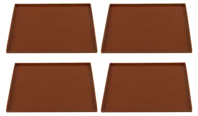 Four brown silicone baking mats arranged in a grid on a white background.