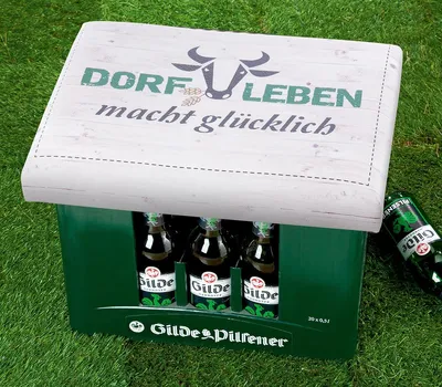 Produktbild von Gilde Sitzpolster, rechteckig, "Dorfleben", Spruch, Kunststoff, naturfarben, VE 6, L. 34 cm, B. 44 cm, H. 5 cm