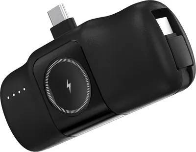 A black portable power bank with USB-C connectors and a wireless charging pad.