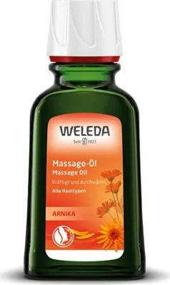 A bottle of Weleda Arnika Massage Oil.