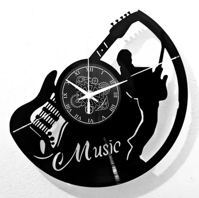 Image de Horloge mural sur le thème des instruments de musique, idéal pour les passionnés de musique